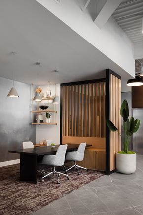 Phoenix apartment for rent - a dining room with a table and chairs and a wooden door