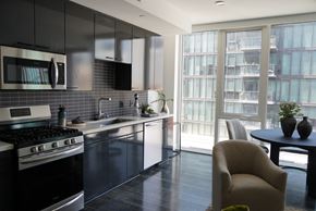 Los Angeles apartment for rent - a kitchen with a sink and a stove and a window