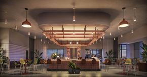 Houston apartment for rent - A modern dining area with a long table set for a meal.