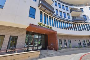 Scottsdale apartment for rent - The image shows the front of a building with a Senatorial sign on it.