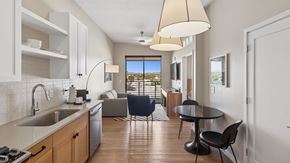 Scottsdale apartment for rent - A kitchen with a table and chairs and a window.