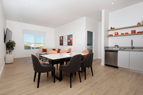 Las Vegas apartment for rent - A modern dining room with a table set for six.