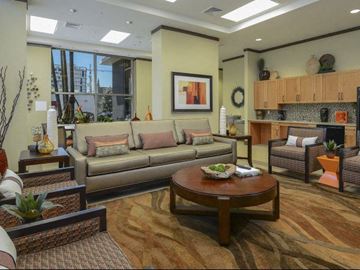Miami apartment for rent - a living room with a couch and a table