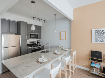 Chef-style kitchens with solid wood cabinets & granite countertops