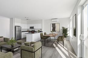 Norwalk apartment for rent - A modern kitchen with a dining table and chairs.
