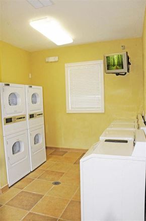 Brandon apartment for rent - a kitchen with two washes and a dryer in it