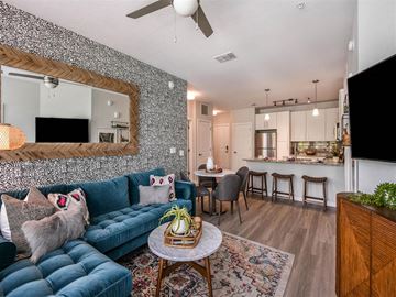 Sarasota apartment for rent - a living room with a couch and a table
