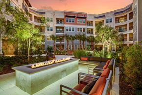 Tampa apartment for rent - Courtyard with Fireside Seating at Grady Square Luxury Apartments in Tampa, FL
