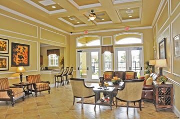 Port Richey apartment for rent - a living room with furniture and a ceiling fan