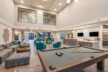 Game lounge with billiards & media wall