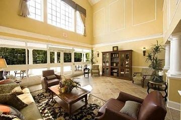 Tinton Falls apartment for rent - a large living room with couches and a table