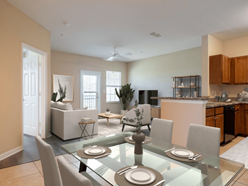 Melbourne apartment for rent - A modern dining room with a glass table and chairs.
