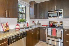 Davie apartment for rent - Modern kitchen with granite countertops at Palm Ranch Apartments in Davie, FL