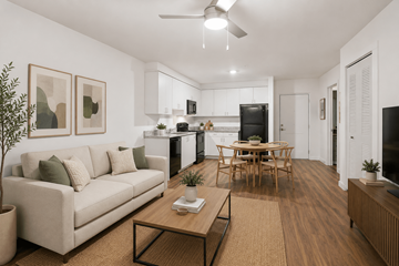 Homestead apartment for rent - A living room with a couch, a coffee table, and a television.