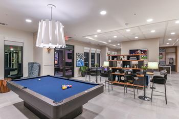 Game lounge with billiards & media wall