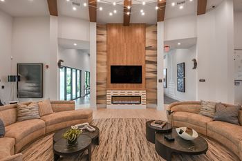 Resident lounge with fireplace, computer flex work stations & lounge seating