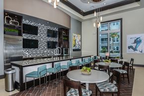 Pinellas Park apartment for rent - Club Room with Demo Kitchen at Epic at Gateway Luxury Apartments in Pinellas Park FL