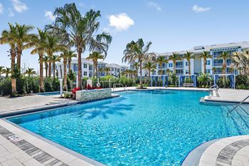 Resort pool with waterfall, lap lane & spa