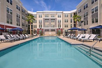 Resort-style pool & heated spa with sun deck & lounge area