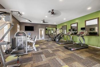 24 Hour fitness center with yoga, cardio and free weight