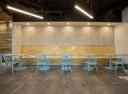 Charleston apartment for rent - a table and chairs in front of a wood wall at 511 Meeting, South Carolina, 29403