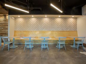 Charleston apartment for rent - a table and chairs in front of a wood wall at 511 Meeting, South Carolina, 29403