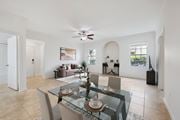 Ocala apartment for rent - A dining room with a glass table and chairs.
