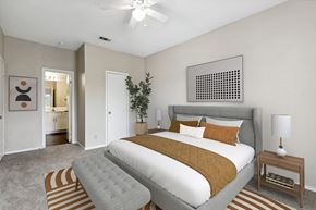 Austin apartment for rent - primary bedroom with ensuite bathroom