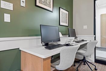 A business center with two computers 