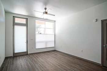 Wood-style plank flooring throughout