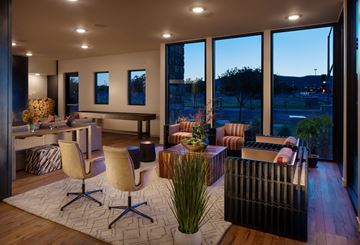 Prescott Valley apartment for rent - a living room filled with furniture and large windows
