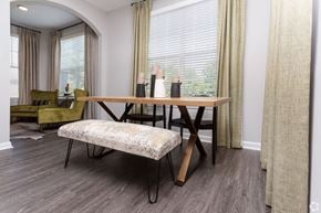 Alpharetta apartment for rent - Living Area with Wood Style Flooring at Emblem Alpharetta Apartments, Alpharetta, GA, 30009