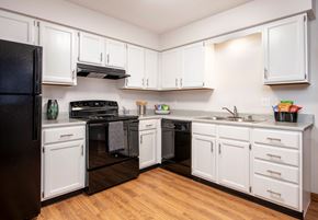 Madison apartment for rent - Kitchen with black appliance package | Preserve West at Preserve West, Wisconsin
