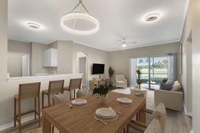 Fort Myers apartment for rent - Open concept Living and Dining Room with attached screened in patio