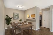 Corpus Christi apartment for rent - A dining room with a table set for four.