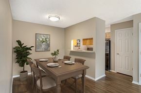 Corpus Christi apartment for rent - A dining room with a table set for four.