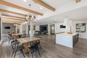 Alpharetta apartment for rent - A modern dining room with a long table and chairs.