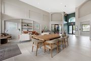 Boynton Beach apartment for rent - A modern dining room with a wooden table and chairs.