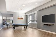 Hartford apartment for rent - A room with a pool table and a television.