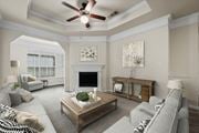 Austin apartment for rent - A living room with a grey couch, a coffee table, a fireplace, and a ceiling fan.
