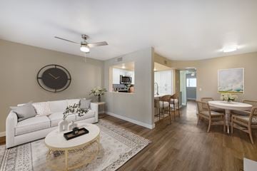 Tucson apartment for rent - A living room with a white couch and a coffee table.