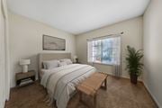 Boynton Beach apartment for rent - A bedroom with a bed, nightstand, and window.