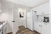 Westborough apartment for rent - A kitchen with white appliances and cabinets.