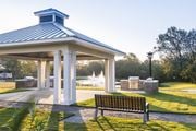 Charleston apartment for rent - A gazebo with a fountain in the background and a bench in the foreground at Wharf 7 Apartments, Charleston, South Carolina