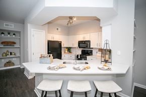Alpharetta apartment for rent - Modern Kitchen with Counter Seating at Emblem Alpharetta Apartments, Alpharetta, Georgia