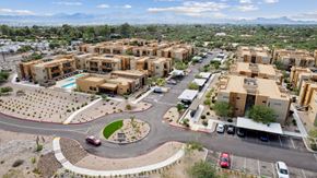 Tucson apartment for rent - an aerial view of a housing complex with a roundabout in the middle of the road at Pima Canyon, Tucson, Arizona