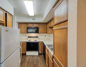 Austin apartment for rent - Kitchen gallery at Village Oaks Apartments, Austin, TX, 78759