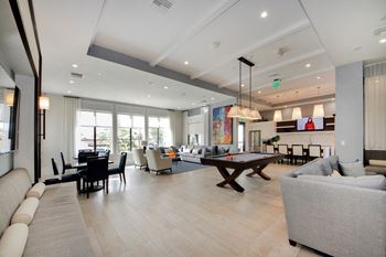 Club room with pool table and seating