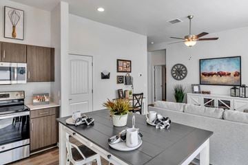 Prescott Valley apartment for rent - an open kitchen and living room with a dining table