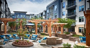 Courtyard with dining tables and comfortable chairs